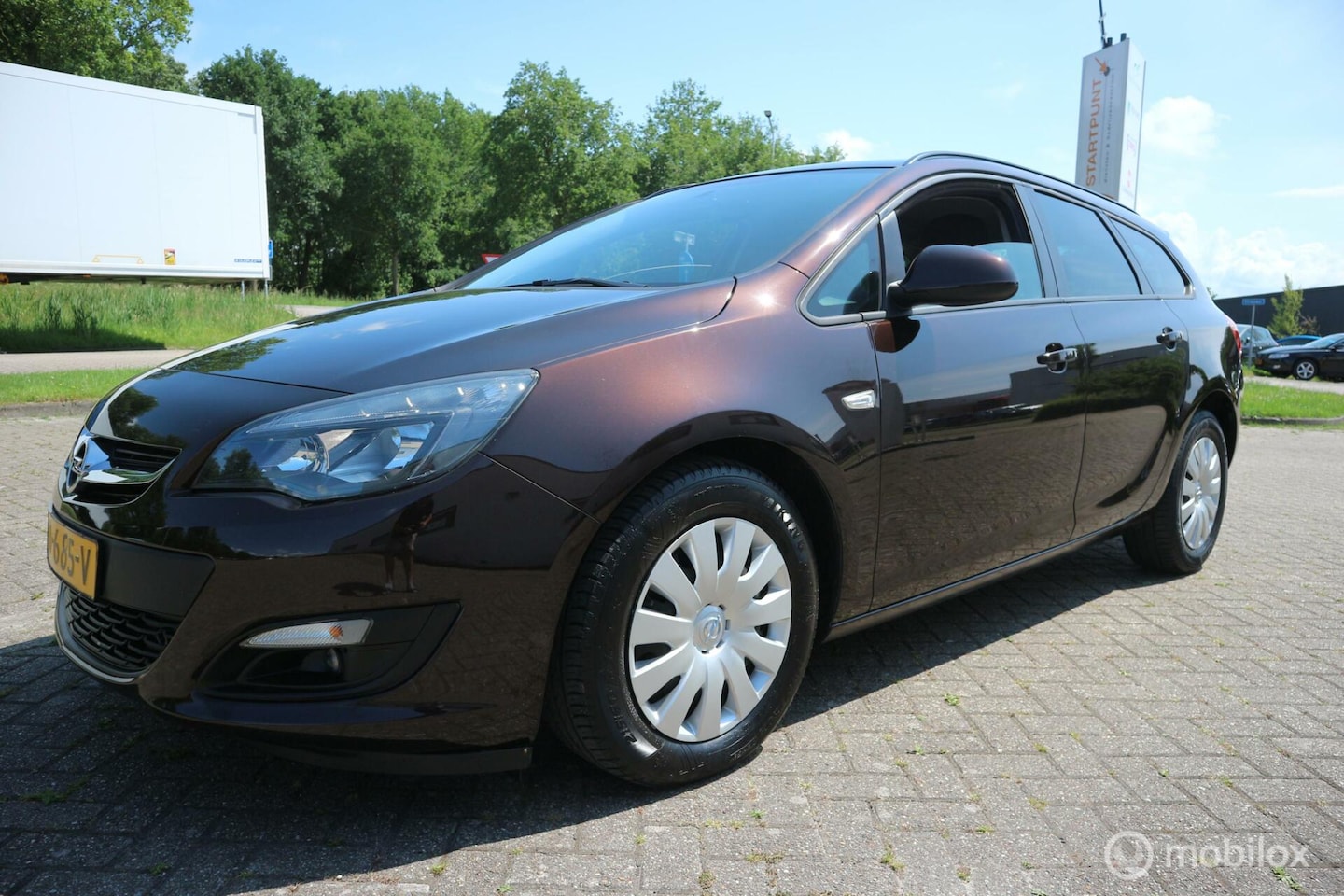 Opel Astra Sports Tourer - 1.7 CDTi AIRCO-ECC/NAVI/TREKHAAK - AutoWereld.nl