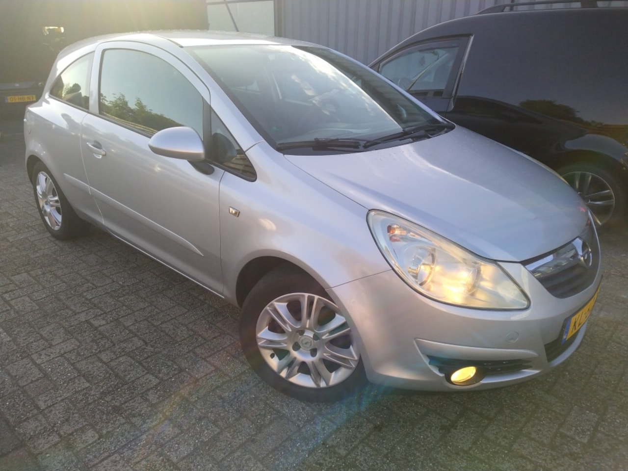 Opel Corsa - 1.0-12V Business 1.0-12V Business - AutoWereld.nl