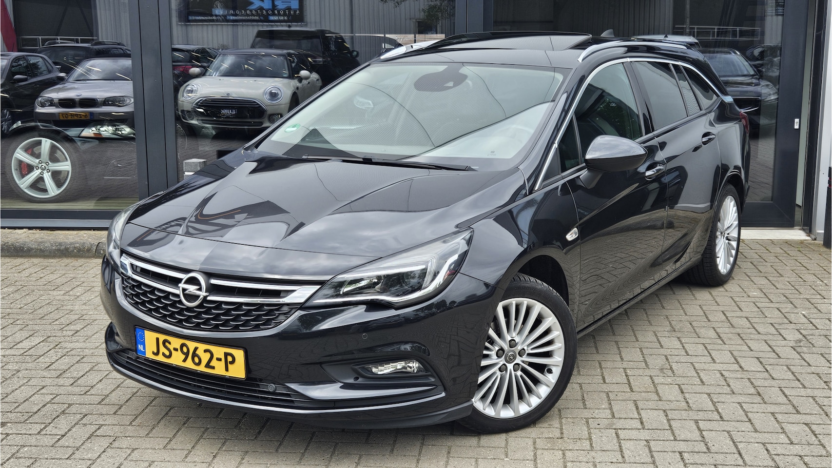 Opel Astra Sports Tourer - 1.0 Innovation + SCHUIFDAK + KEYLESS + COMFORTSTOELEN + CAMERA - AutoWereld.nl