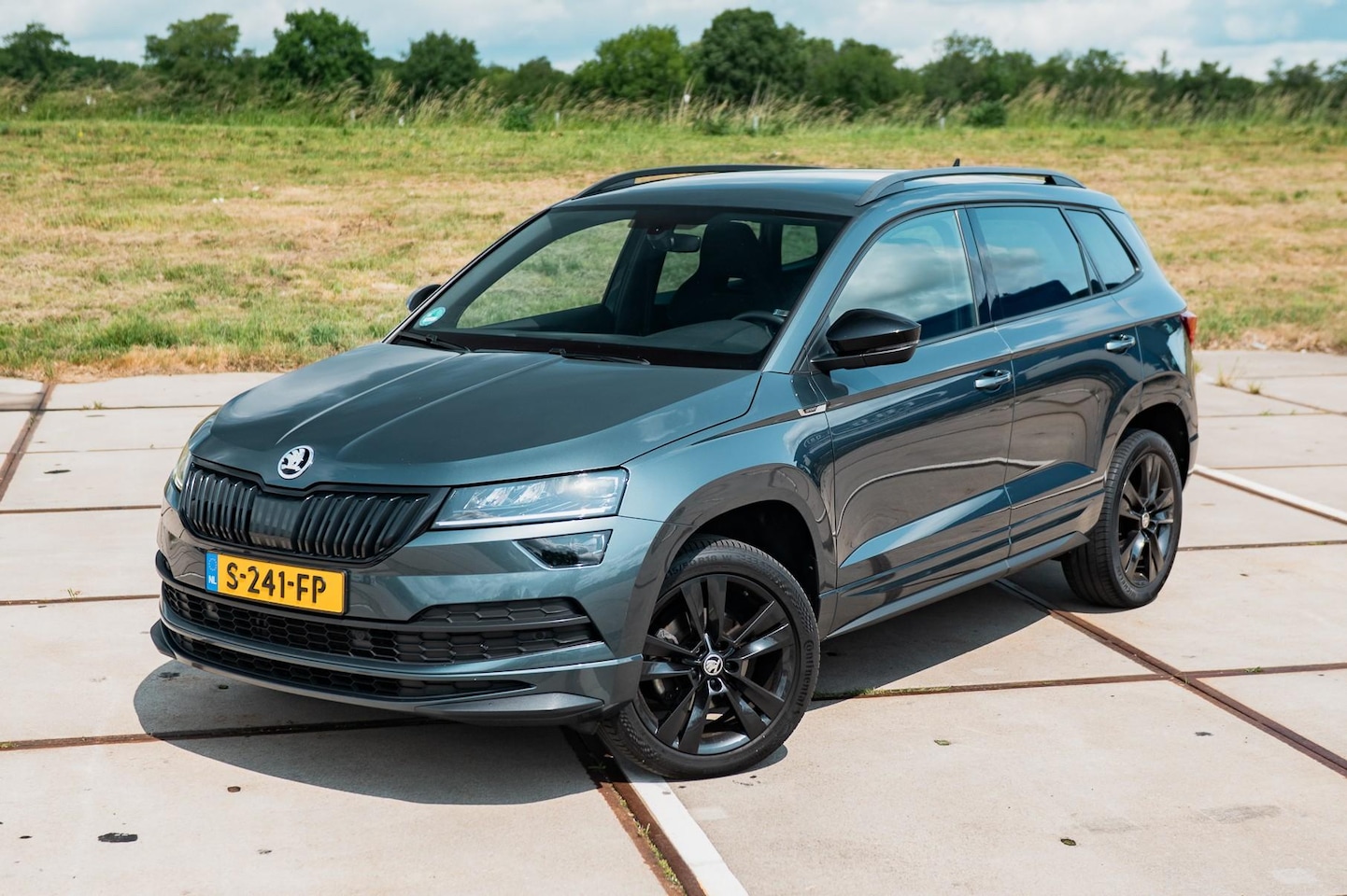 Skoda Karoq - 1.5 TSI ACT Sportline Business | TREKHAAK | DIGI DASH | CLIMA | NAVI - AutoWereld.nl
