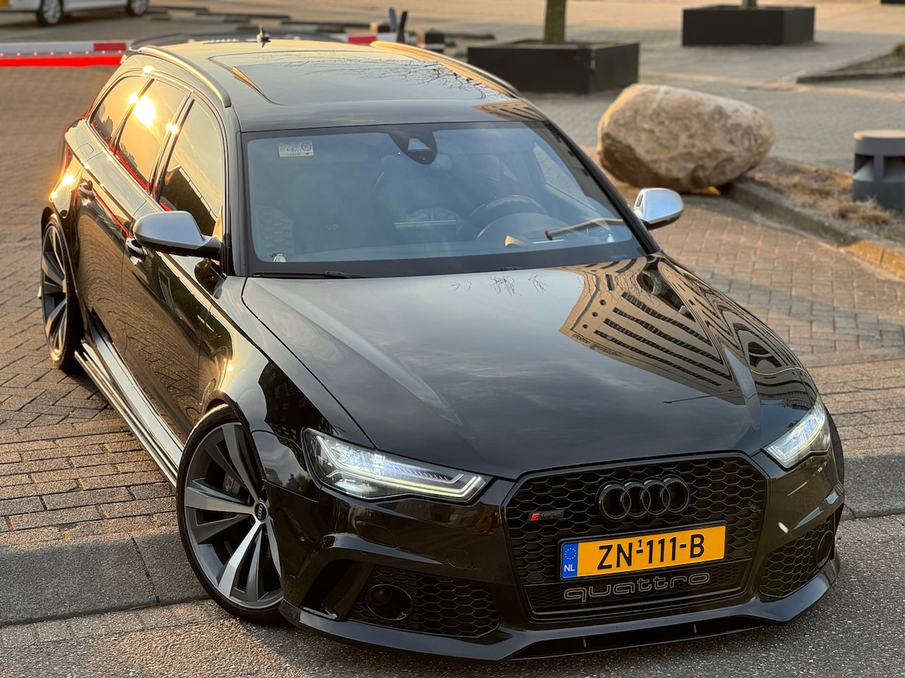 Audi RS6 - 4.0 TFSI V8 EXCLUSIVE B&O.Carbon.Pano.21''AKRAPOVIC - AutoWereld.nl