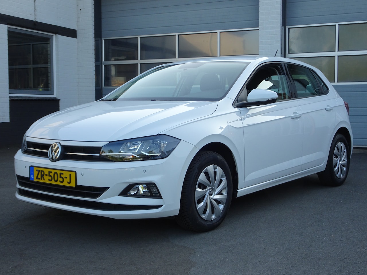 Volkswagen Polo - 1.0 TSI Comfortline Airco, navigatie, cruise controle, parkeersensoren voor en achter, enz - AutoWereld.nl