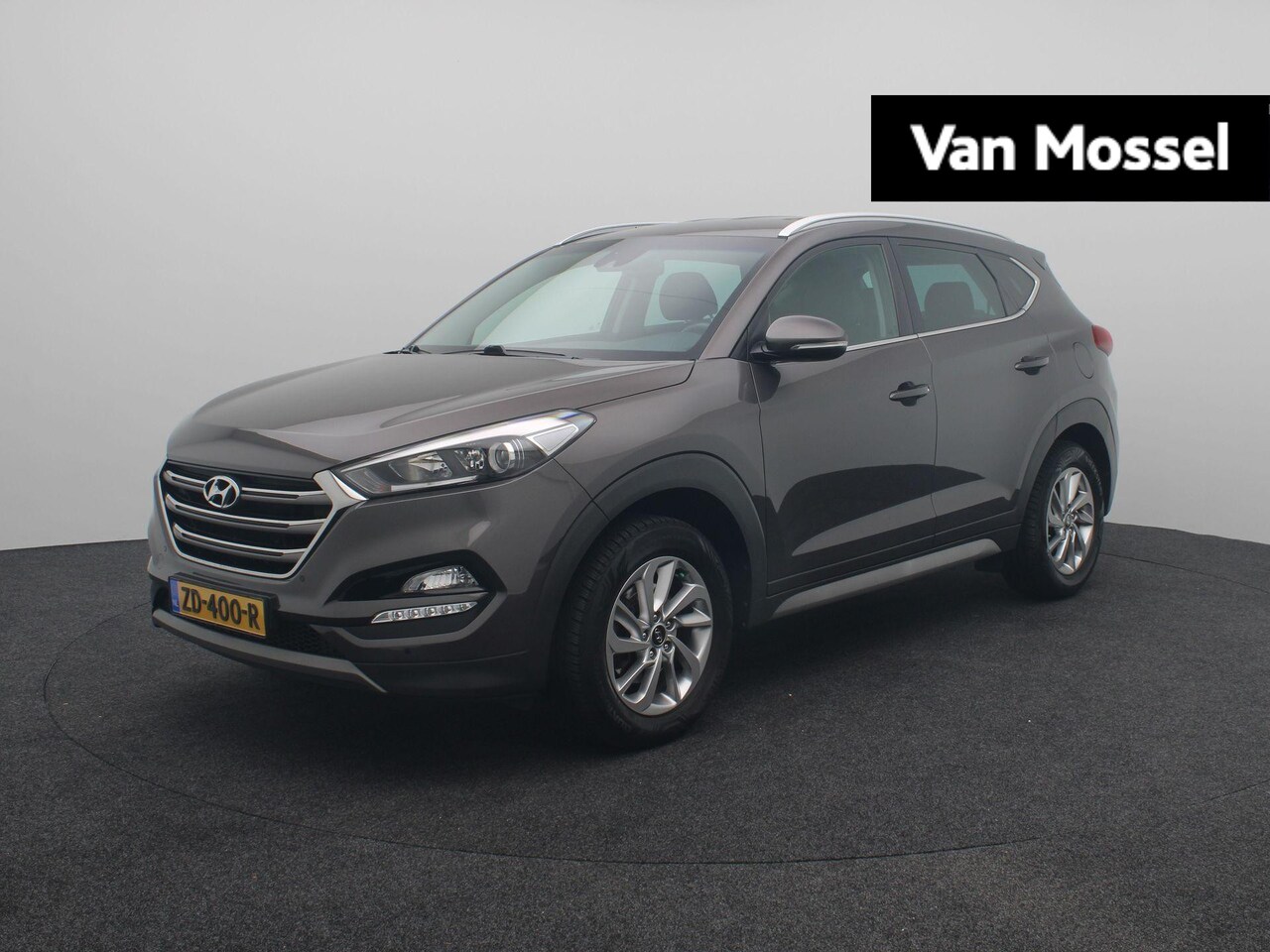 Hyundai Tucson - 1.6 GDi Comfort | Navigatie | Climate Control | Trekhaak | Stoelverwarming | DAB Radio | P - AutoWereld.nl