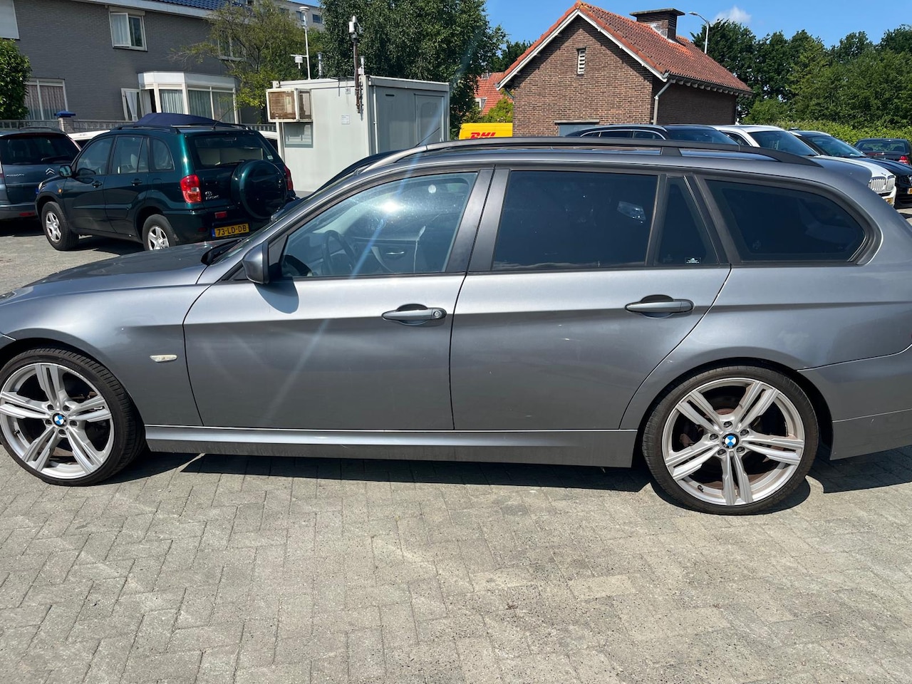 BMW 3-serie Touring - 318i Business Line ecc lm velgen open dak - AutoWereld.nl
