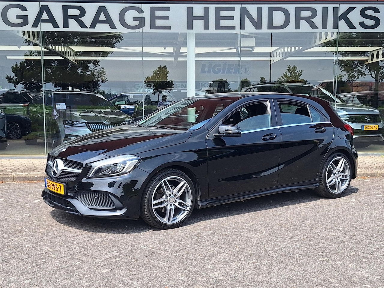 Mercedes-Benz A-klasse - 180 AMG Styling | LED | NAVI | PDC | Trekhaak 1200kg | (occasion) - AutoWereld.nl