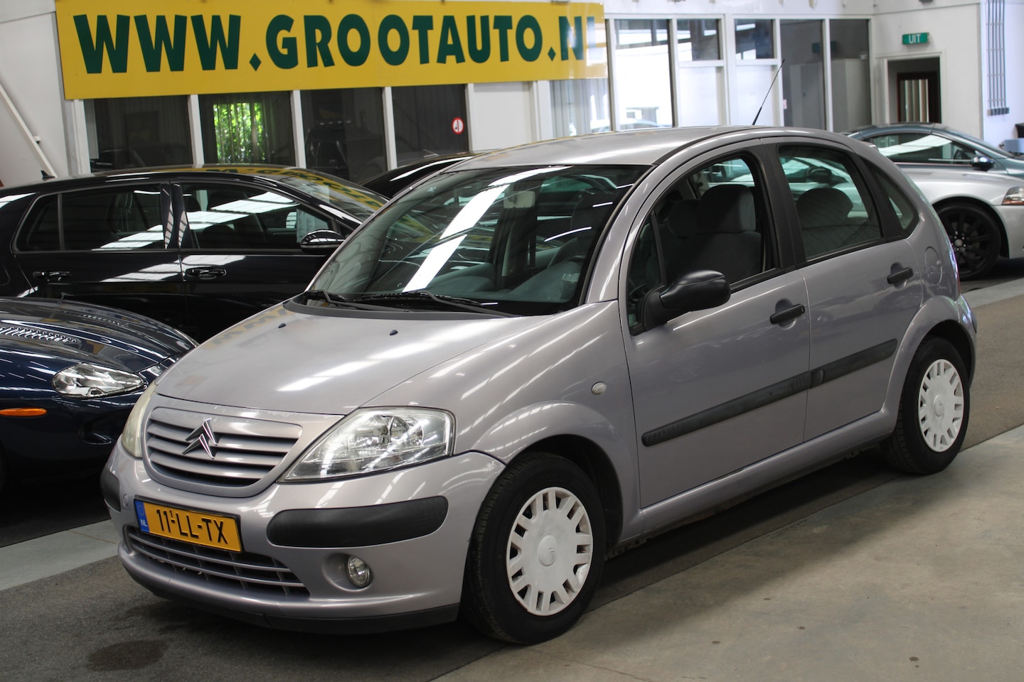 Citroën C3 - 1.4i Ligne Ambiance NAP, Airco, Cruise control, Trekhaak - AutoWereld.nl