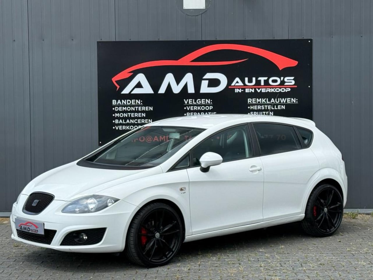 Seat Leon - 1.2 TSI Ecomotive Style |Nap|Cruise|Airco|Elec Ramen|Stoelverwarming|Boekje| - AutoWereld.nl