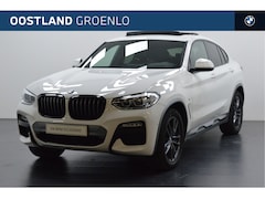 BMW X4 - xDrive20i High Executive M Sport Automaat / Panoramadak / Trekhaak / Sportstoelen / Achter