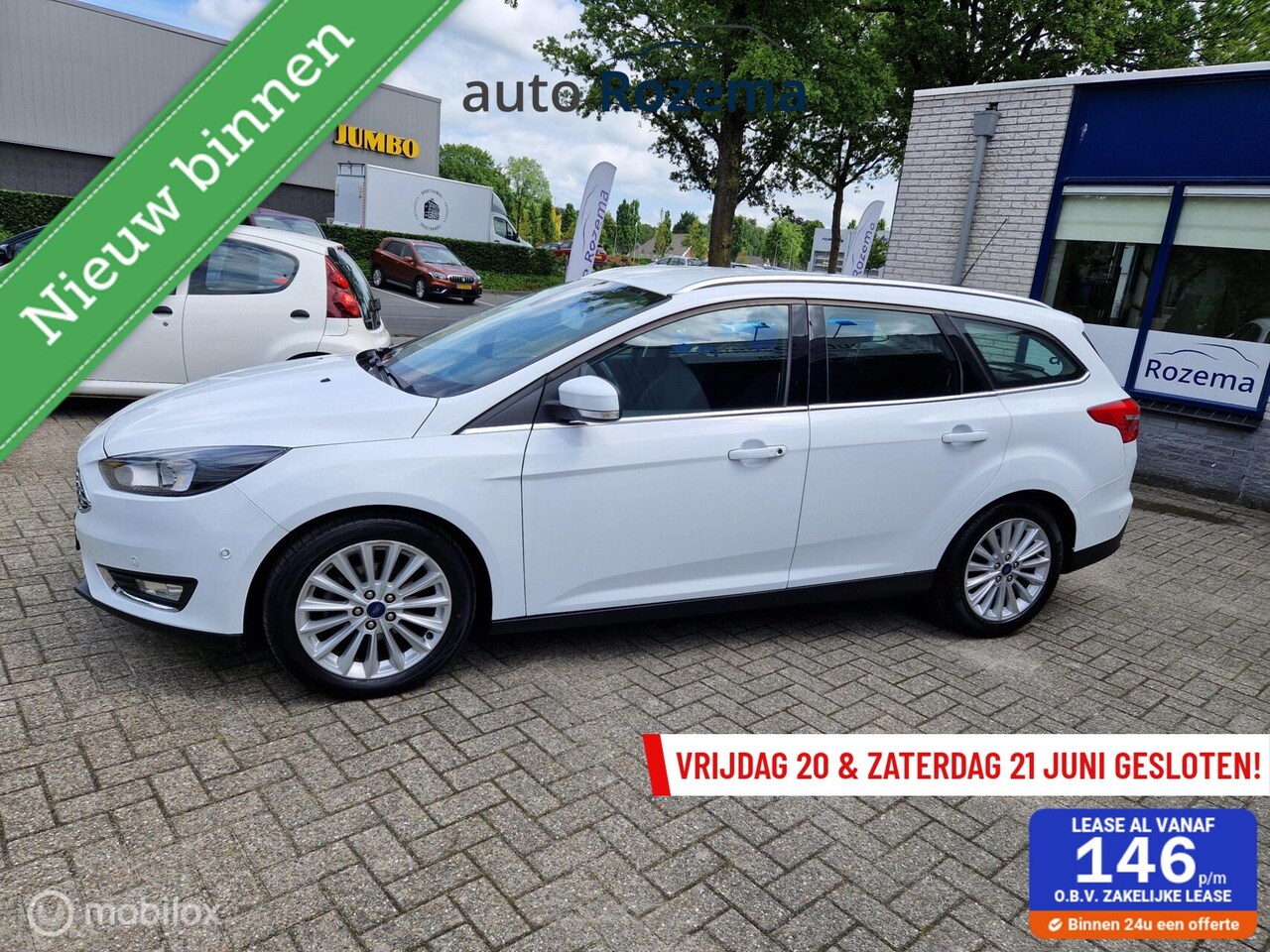 Ford Focus Wagon - 1.0 Titanium Ecc Cruis Navi Haak 118070 km - AutoWereld.nl