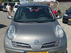 Nissan Micra - 1.2 Acenta airco 5drs deukje in rechter voorscherm