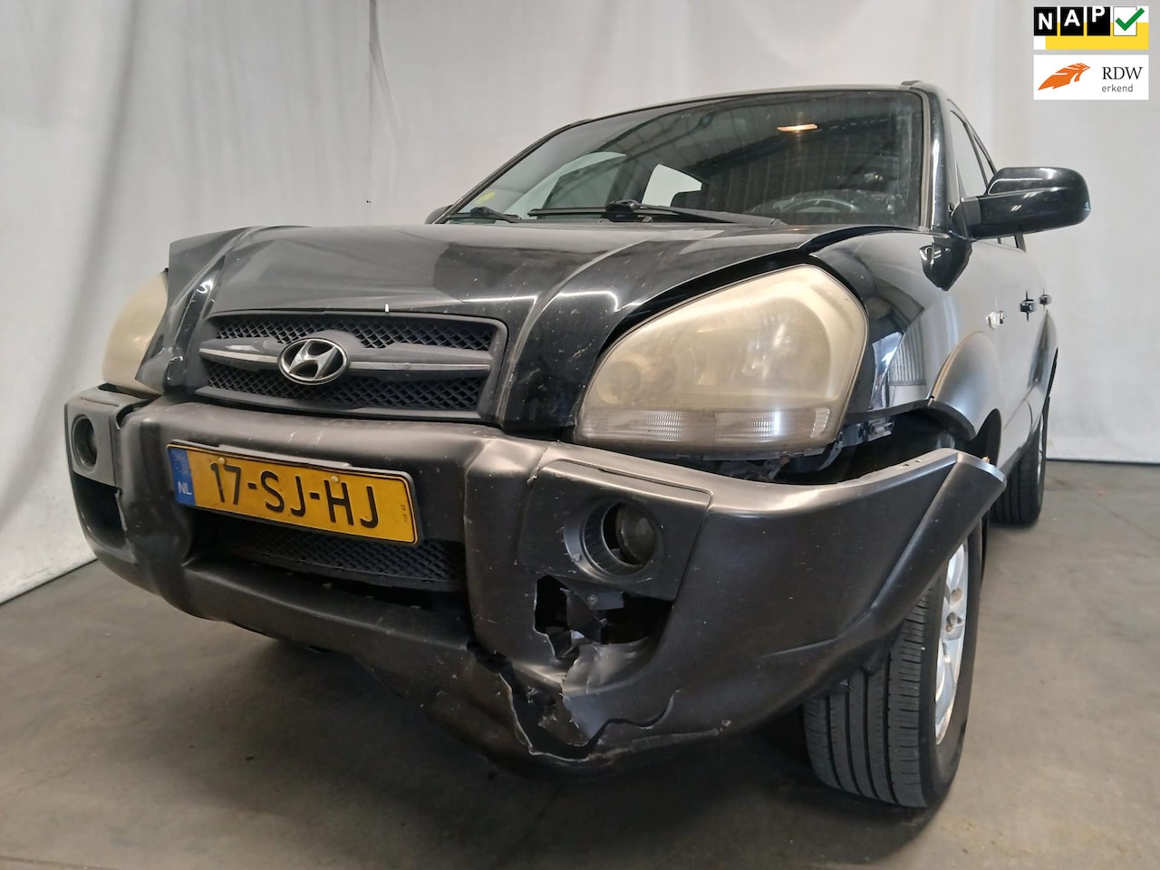 Hyundai Tucson - 2.0i 4WD Style - Airco - Front Schade - AutoWereld.nl