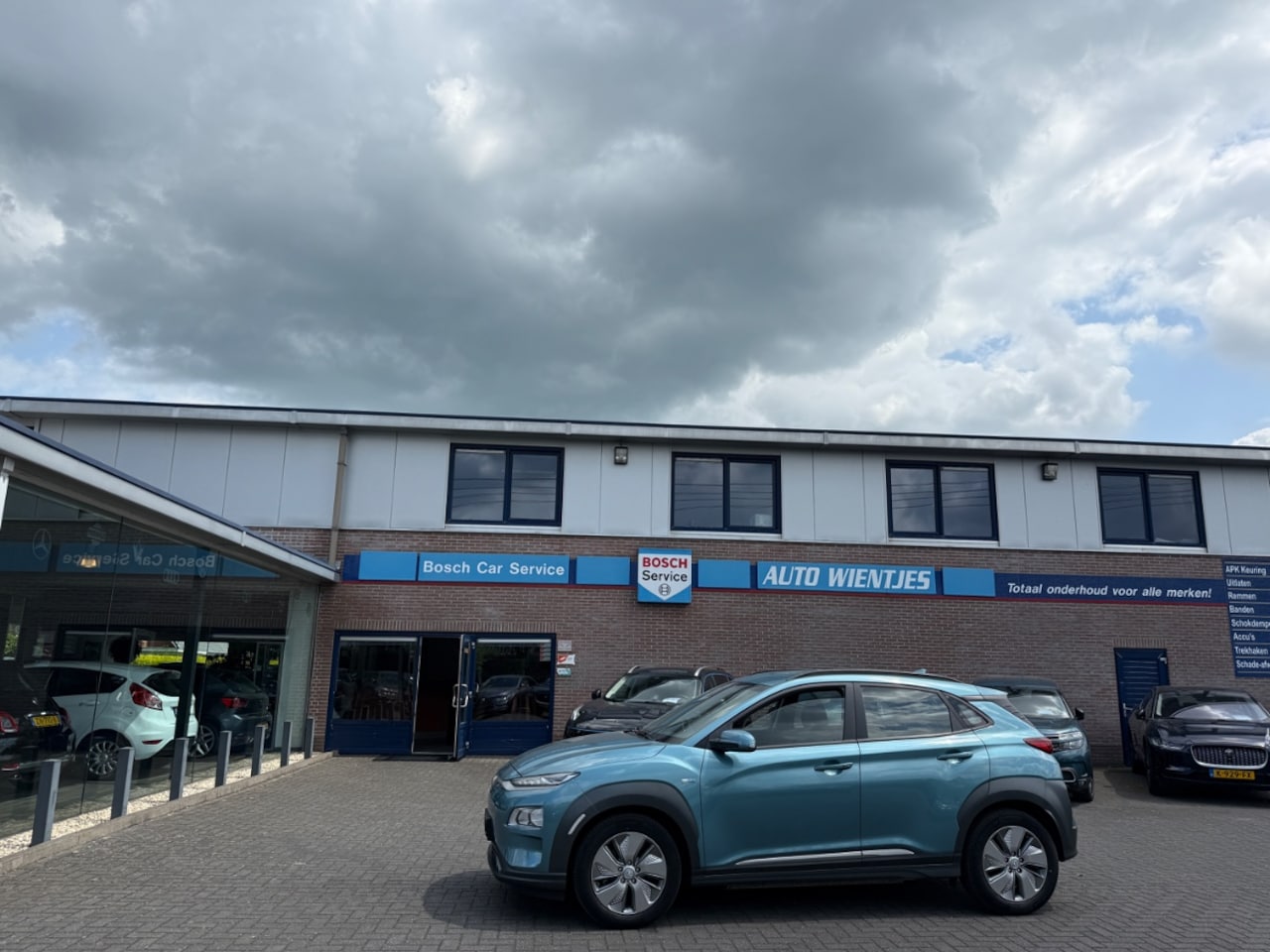 Hyundai Kona Electric - EV Comfort 64kWh | Leer | Navi - AutoWereld.nl