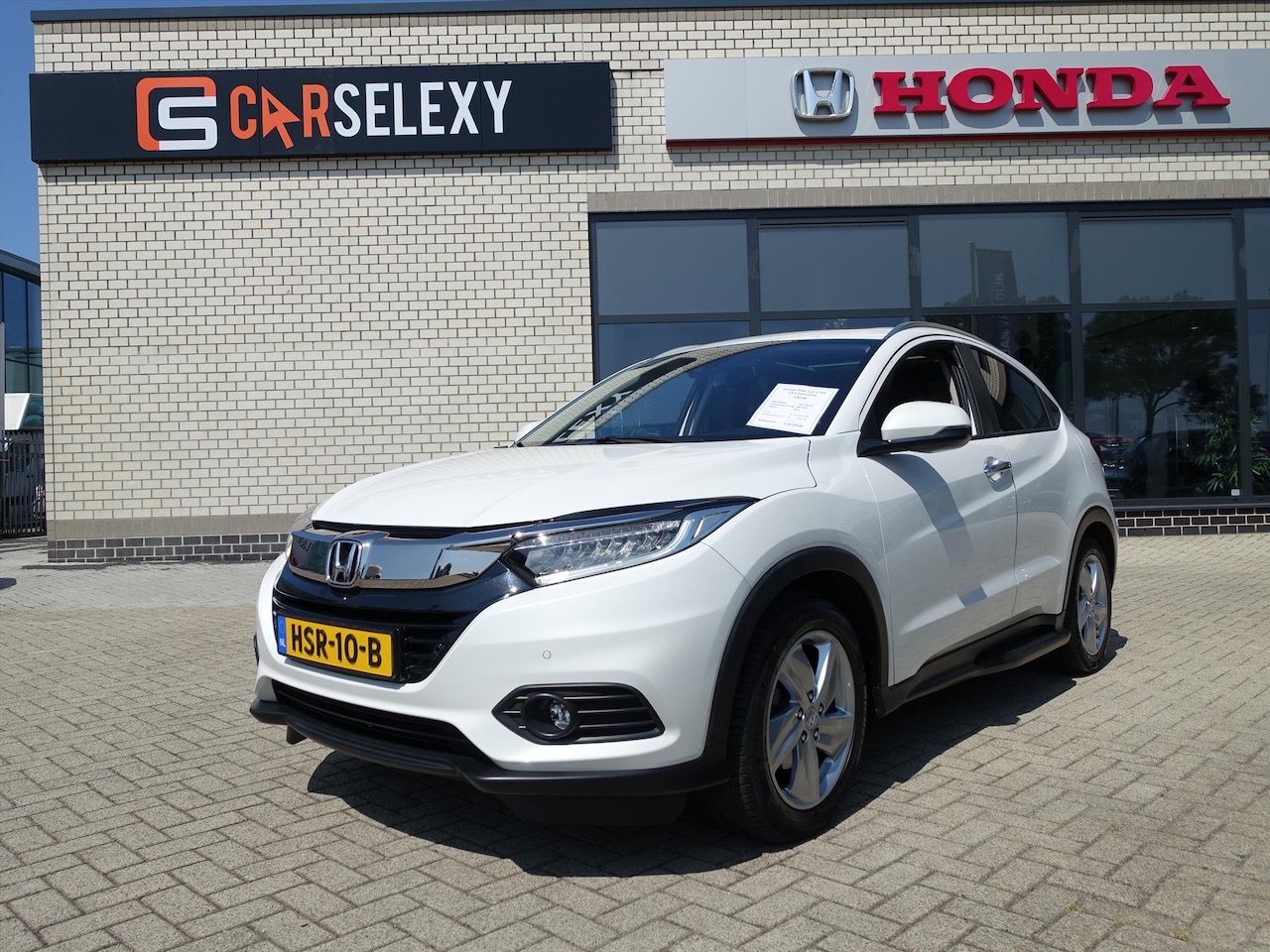 Honda HR-V - 1.5 i-VTEC 130pk CVT Executive Standkachel Trekhaak Treeplanken Instaplijsten - AutoWereld.nl