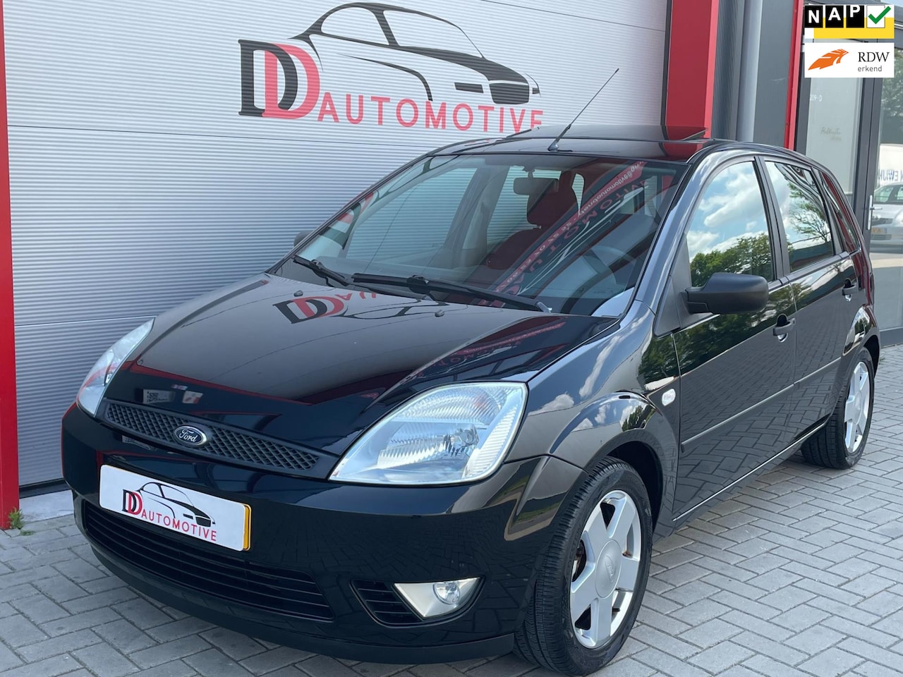 Ford Fiesta - 1.4-16V Ghia AUTOMAAT/AIRCO/PANORAMADAK/ELEKTR RAMEN - AutoWereld.nl