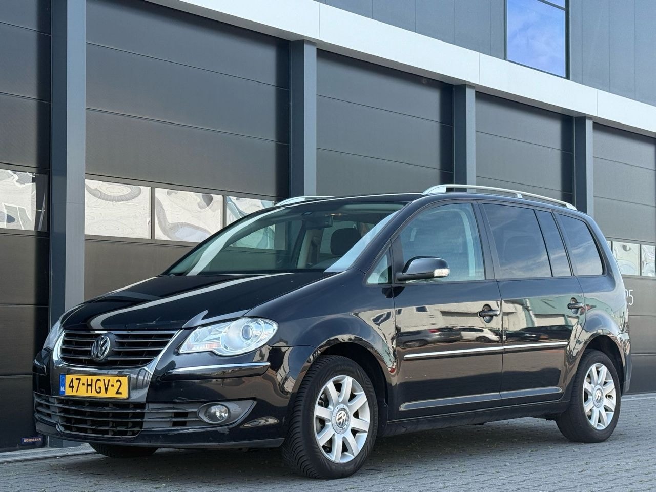 Volkswagen Touran - 1.9 TDI Highline Clima Navi - AutoWereld.nl