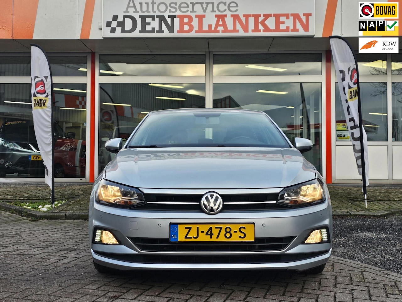 Volkswagen Polo - 1.0 TSI Comfortline BJ.2019 / Navi / Half Leder / Sportstoelen / Alarm / Pdc !! - AutoWereld.nl