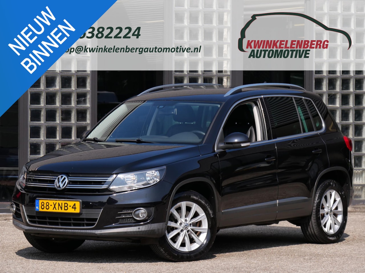 Volkswagen Tiguan - 1.4TSi SPORT & STYLE/ LEER/ TREKHAAK/ PDC V+A - AutoWereld.nl
