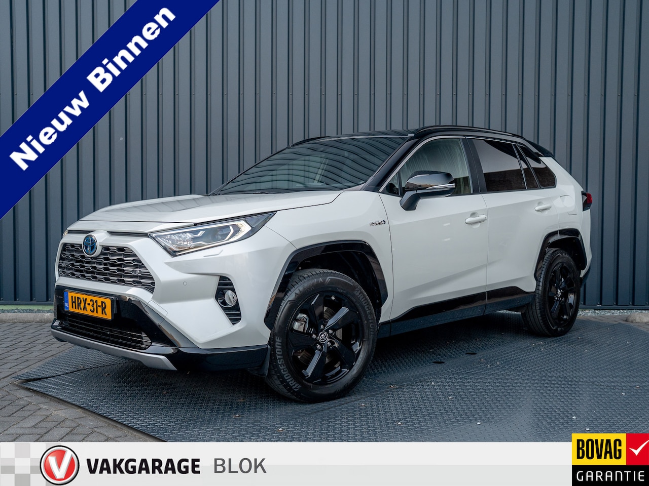 Toyota RAV4 - 2.5 Hybrid Bi-Tone | Navi | Camera | Elk. A-klep | Stuur & Stoel verw. | Prijs Rijklaar!! - AutoWereld.nl