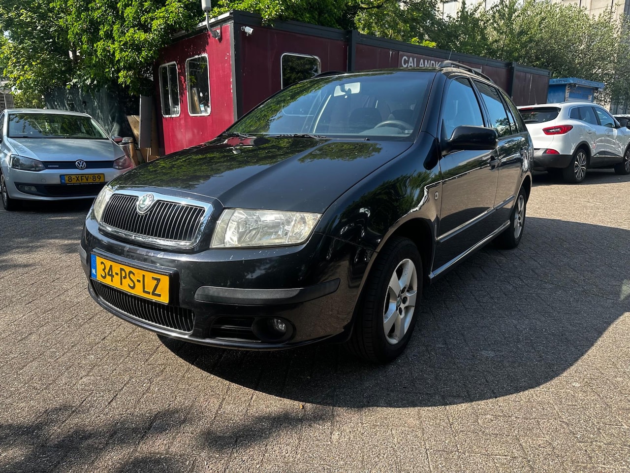 Skoda Fabia Combi - 1.4-16V Elegance , airco , nap ,nw apk - AutoWereld.nl