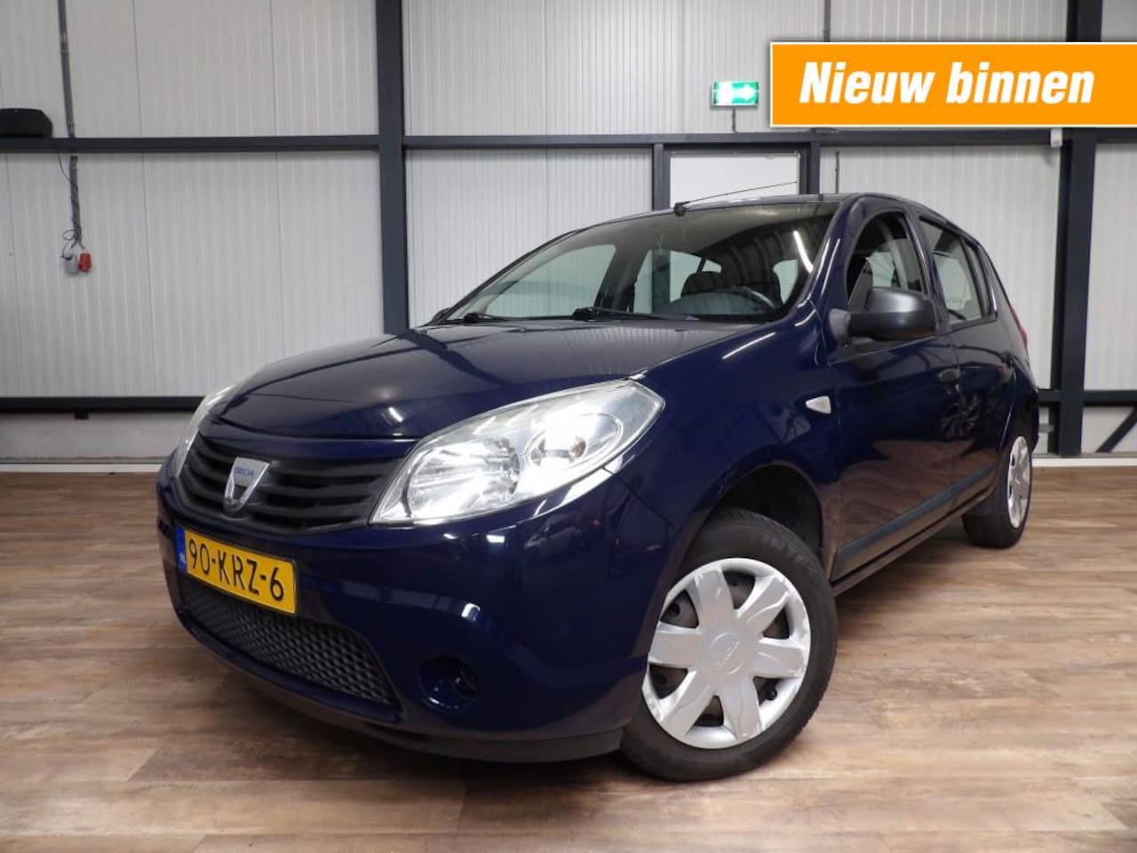 Dacia Sandero - 1.1 5 drs - airco - navigatie - camera - trekhaak - AutoWereld.nl