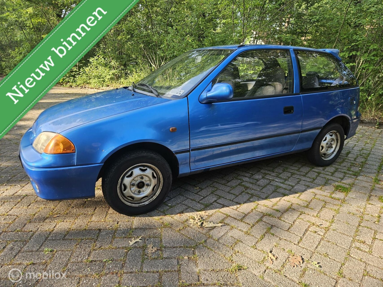 Suzuki Swift - 1.0 GL inruilkoopje lange apk - AutoWereld.nl