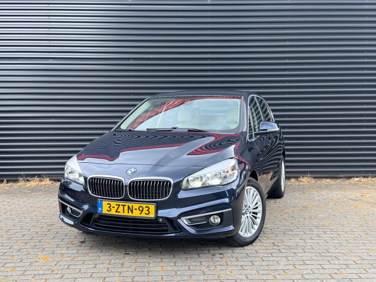 BMW 2-serie Active Tourer - 220i Luxury | Automaat | Navigatie | Cruise control | Lederen bekleding | Airconditioning - AutoWereld.nl
