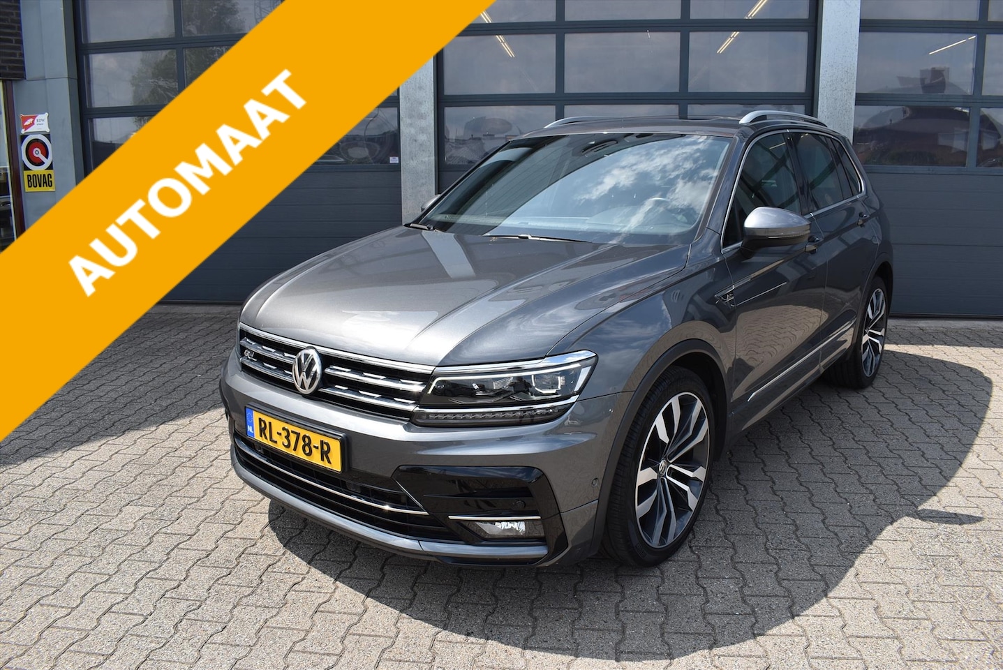 Volkswagen Tiguan - 2.0 TSI 180pk 4Motion DSG Highline Business R - AutoWereld.nl