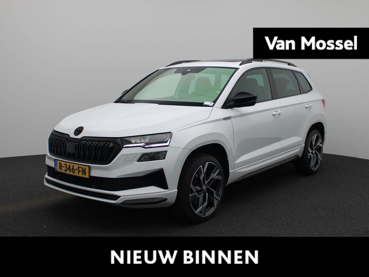 Skoda Karoq - 1.5 TSI ACT Sportline Business | Climate Control | Panoramadak | Stoelverwarming | Camera - AutoWereld.nl