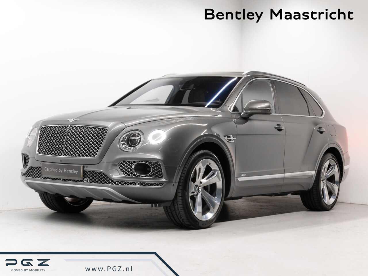 Bentley Bentayga - 3.0 V6 Hybrid MULLINER | TORUING | NAIM | COMFORT SEATS - AutoWereld.nl