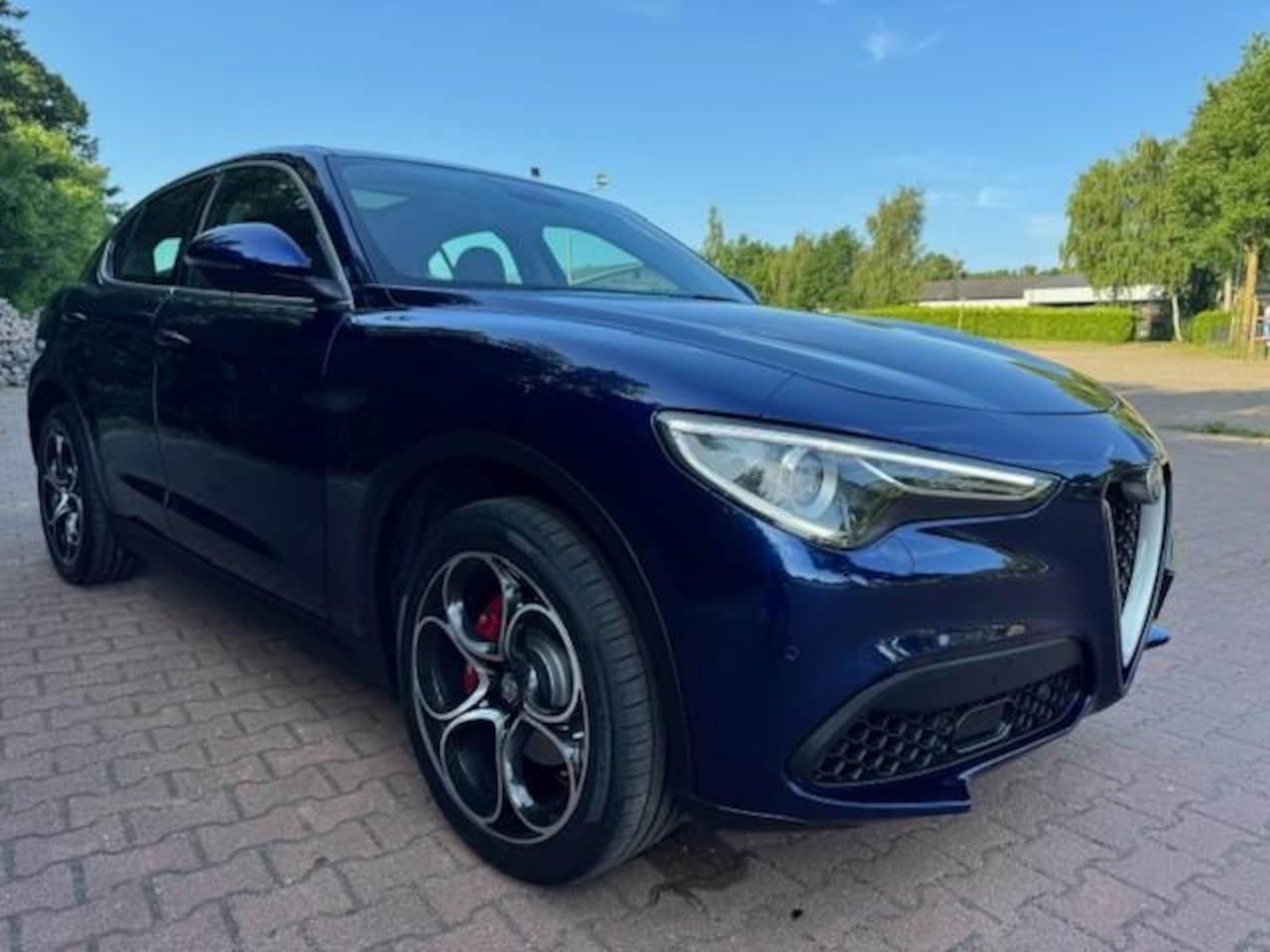 Alfa Romeo Stelvio - 2.0T 280PK AWD Q4 B-TECH/PANO/LEER/HARMAN KARDON - AutoWereld.nl