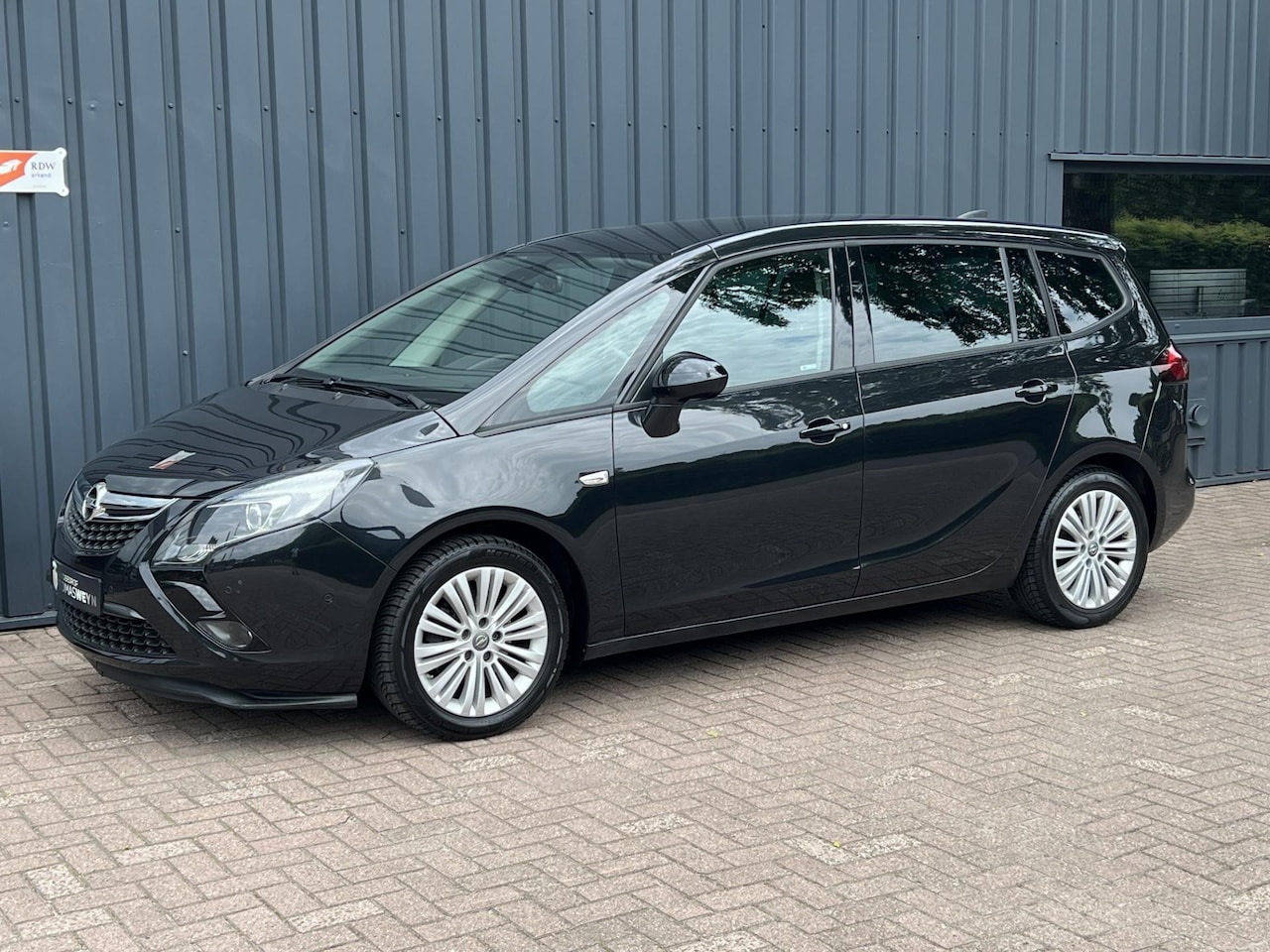 Opel Zafira Tourer - 1.4 Innovation 7-PERSOONS! NAVIGATIE!/115.523 KM!/CRUISE!/ - AutoWereld.nl