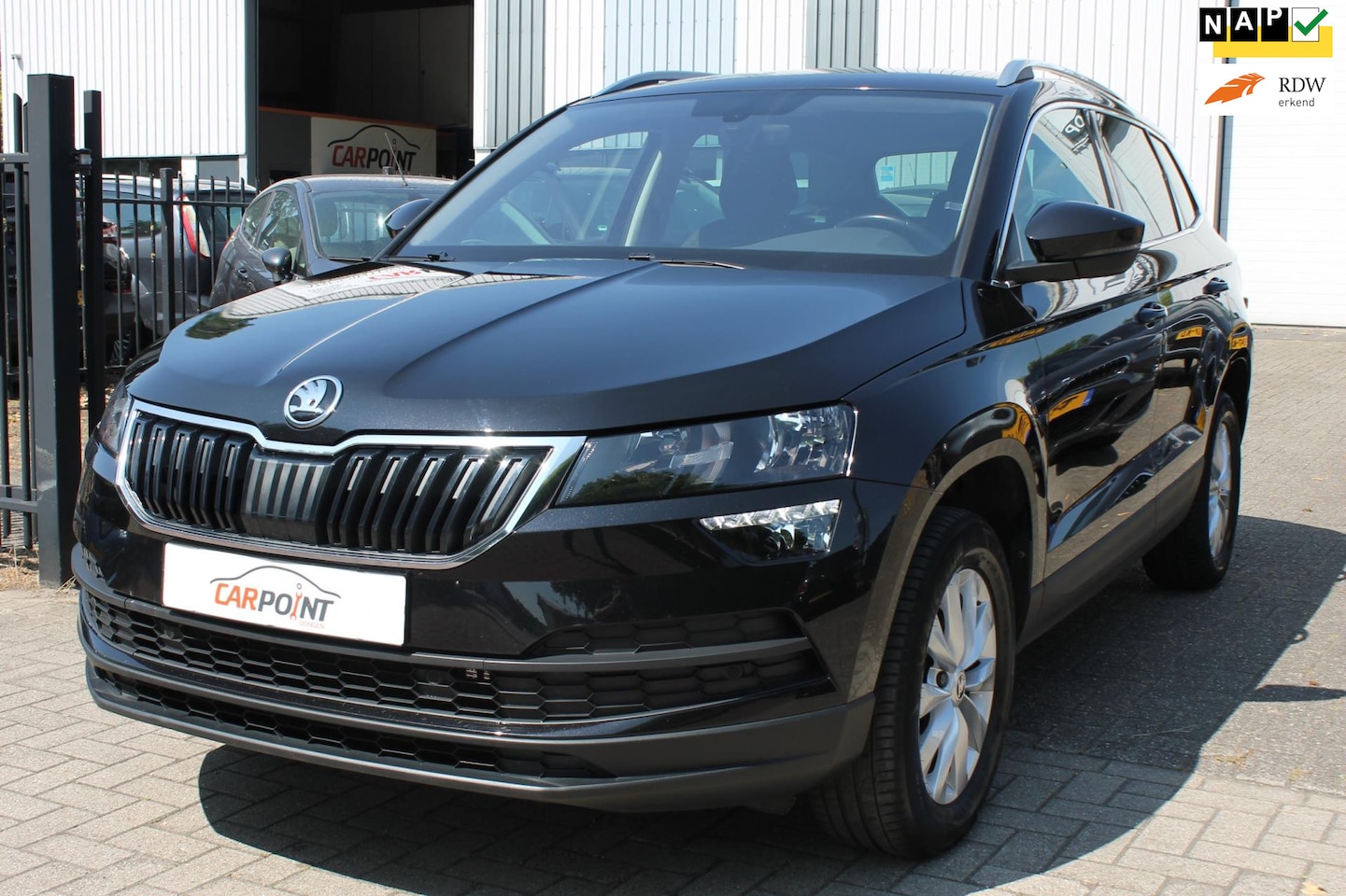 Skoda Karoq - 1.5 TSI ACT Business Edition Keyless Cruise Navi Camera! - AutoWereld.nl