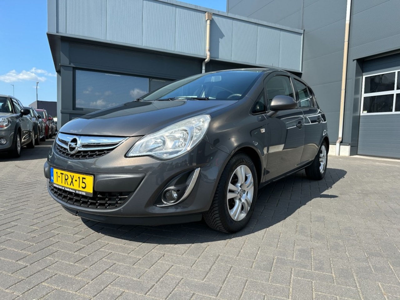 Opel Corsa - 1.2-16V Design Edition Grijs Automaat 5drs, Airco, Cruise contro - AutoWereld.nl