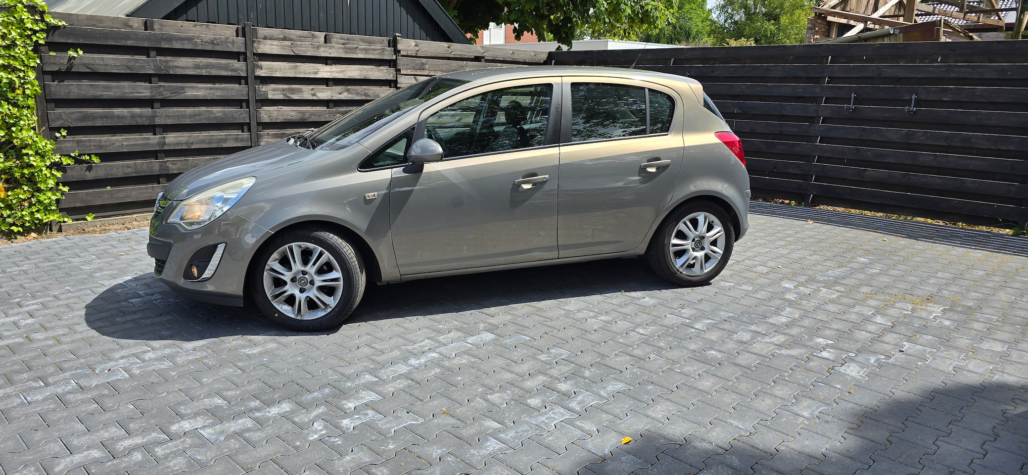 Opel Corsa - 1.4-16V Cosmo stuur- en stoelverwarming - AutoWereld.nl