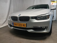 BMW 3-serie - 320i High Executive - Airco - Navi - Leer - Schade