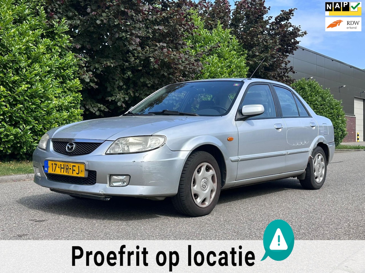 Mazda 323 - 1.6i Exclusive Airco*Trekhaak*NAP*1e Eigenaar*LM velgen* - AutoWereld.nl