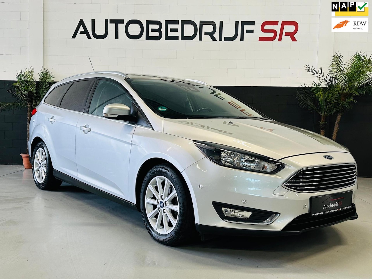 Ford Focus Wagon - 1.0 Titanium Edition Cruise Controle! Navigatie! Trekhaak! Vol opties! - AutoWereld.nl