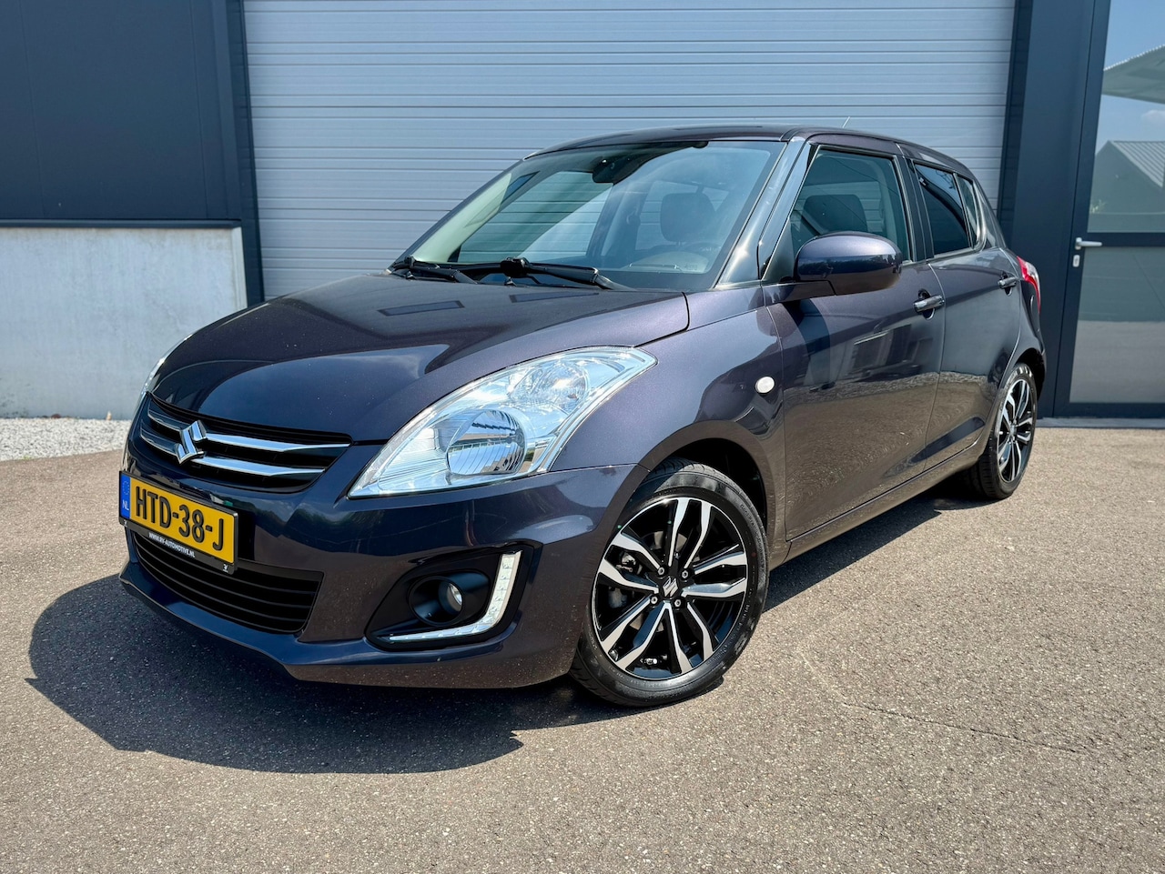 Suzuki Swift - X-TRA / Cruise / Airco / Stoelverwarming - AutoWereld.nl