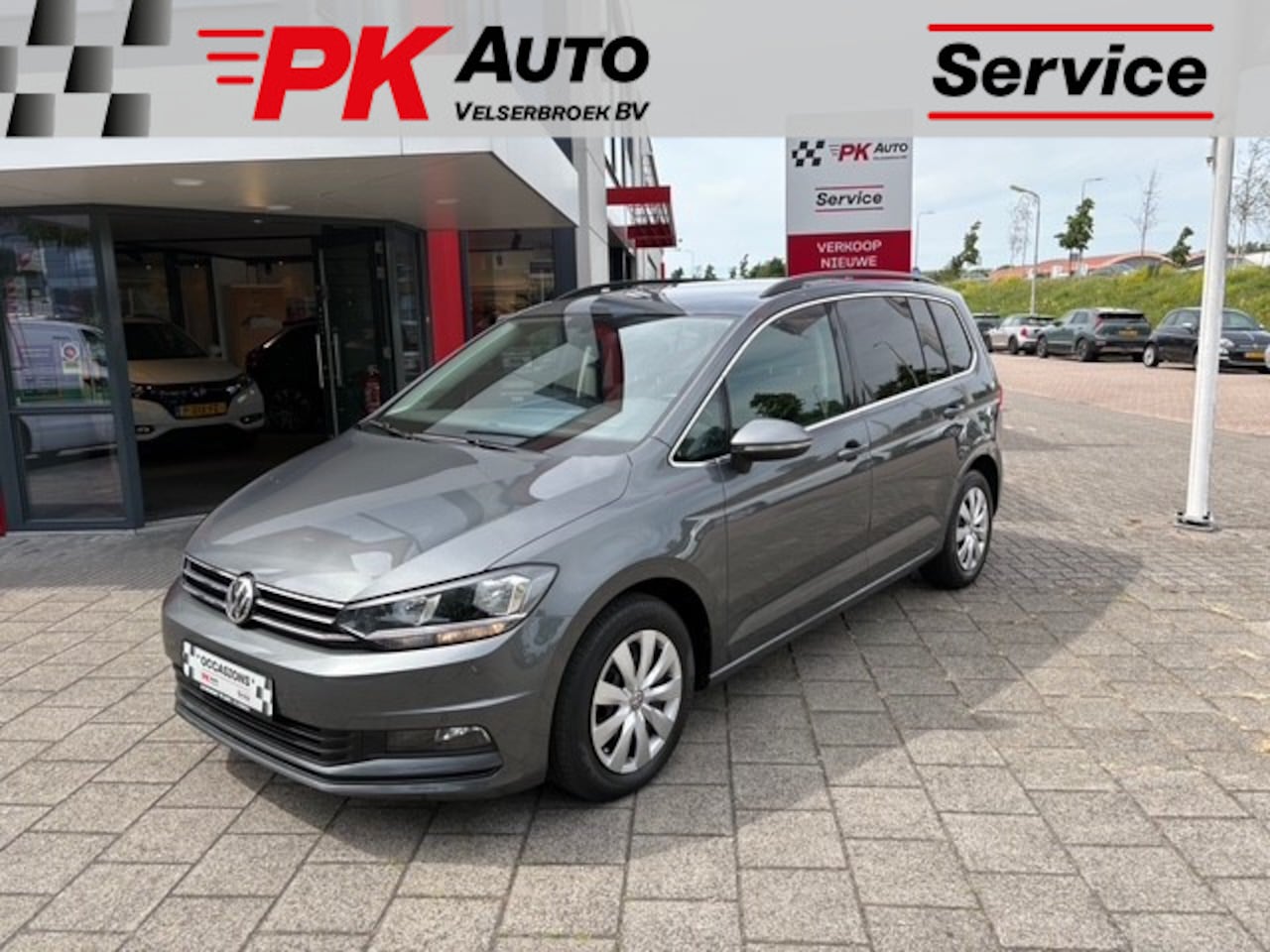 Volkswagen Touran - 1.5 TSI Comfortline Business 7p | Navi | Cruise | 89.048 km Dealeronderhouden - AutoWereld.nl