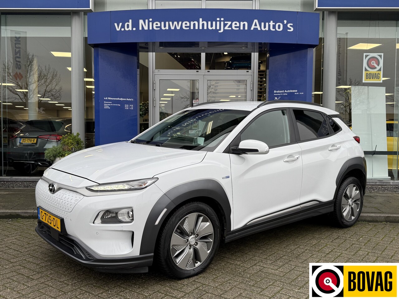 Hyundai Kona Electric - EV Premium 64 kWh | Leder | HUD | Navi | € 2000,- Inruilpremie ! |   Info Bas 0492588982 - AutoWereld.nl