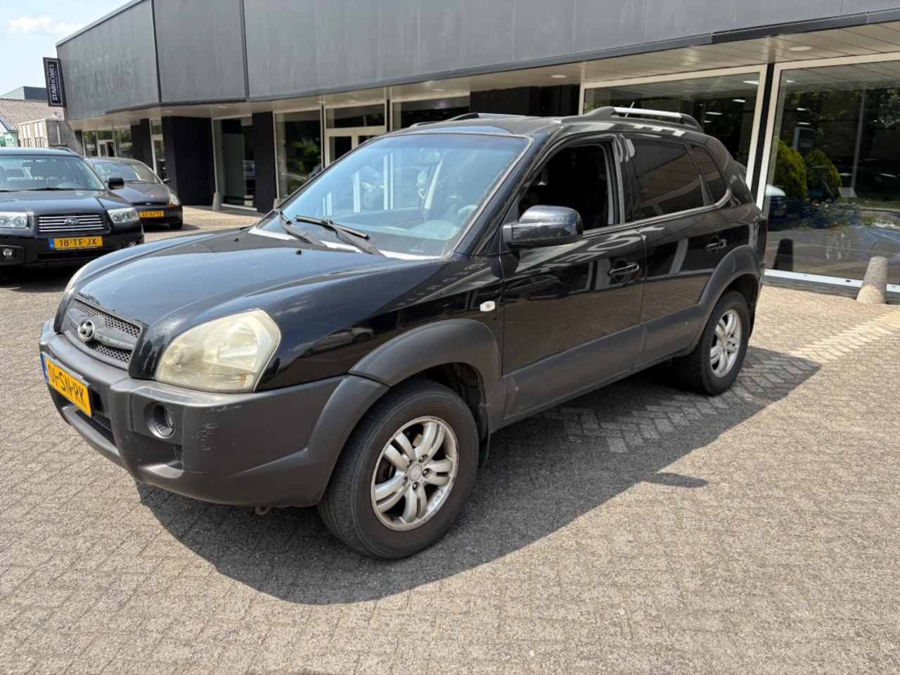 Hyundai Tucson - 2.0I 4WD / EXPORT / CLIMAT / CRUISE / APK -4-2026 / AUDIO - AutoWereld.nl