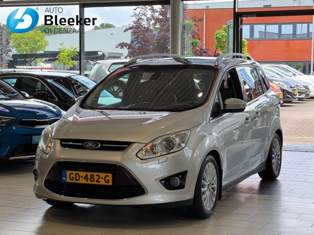 Ford Grand C-Max - 1.6 Titanium Airco Panodak  Electr achterklep Stoel voorruit verwarmd Leder - AutoWereld.nl