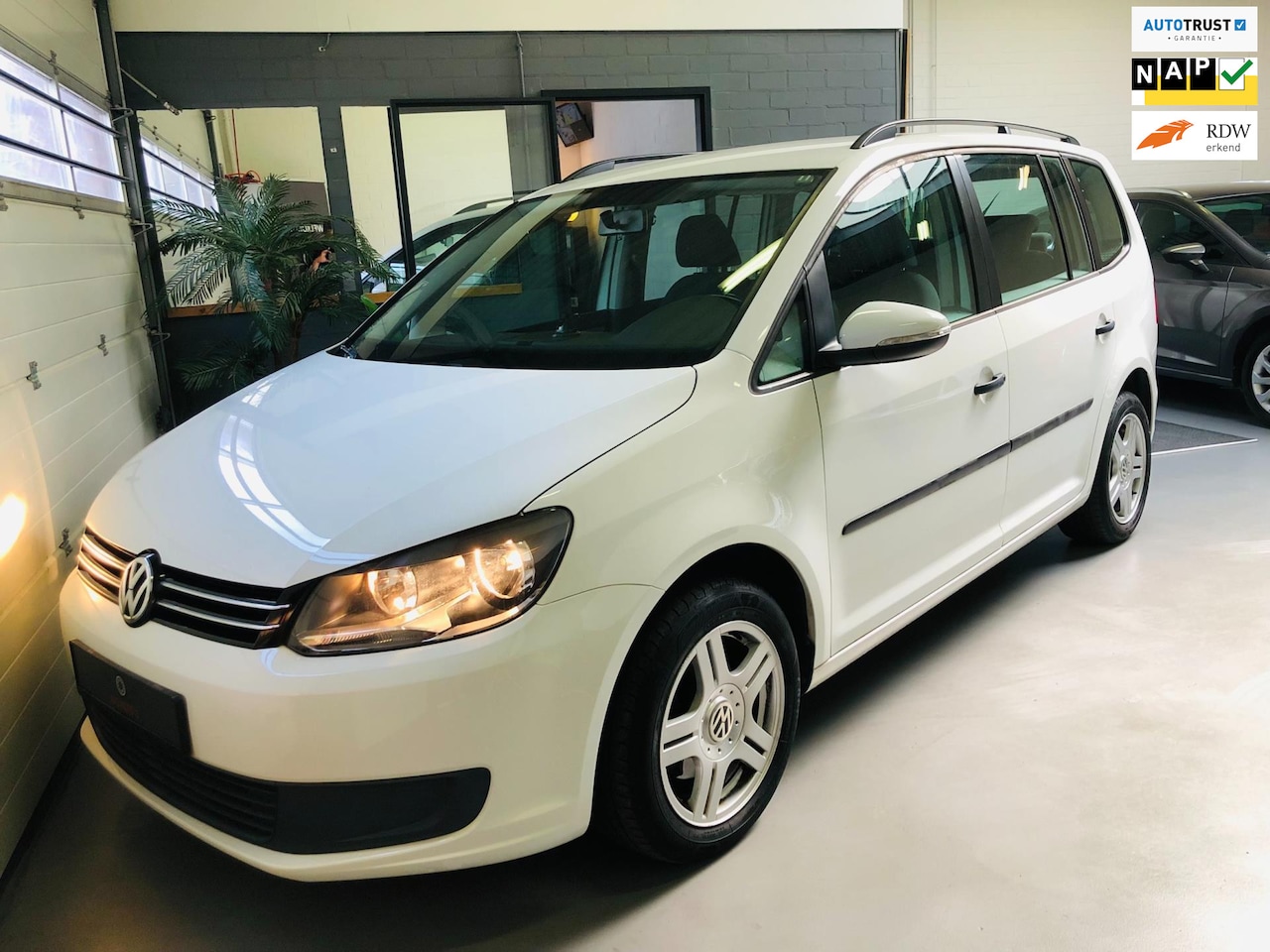 Volkswagen Touran - 1.2 TSI 7 persoons/ Climate control/ TOP! - AutoWereld.nl