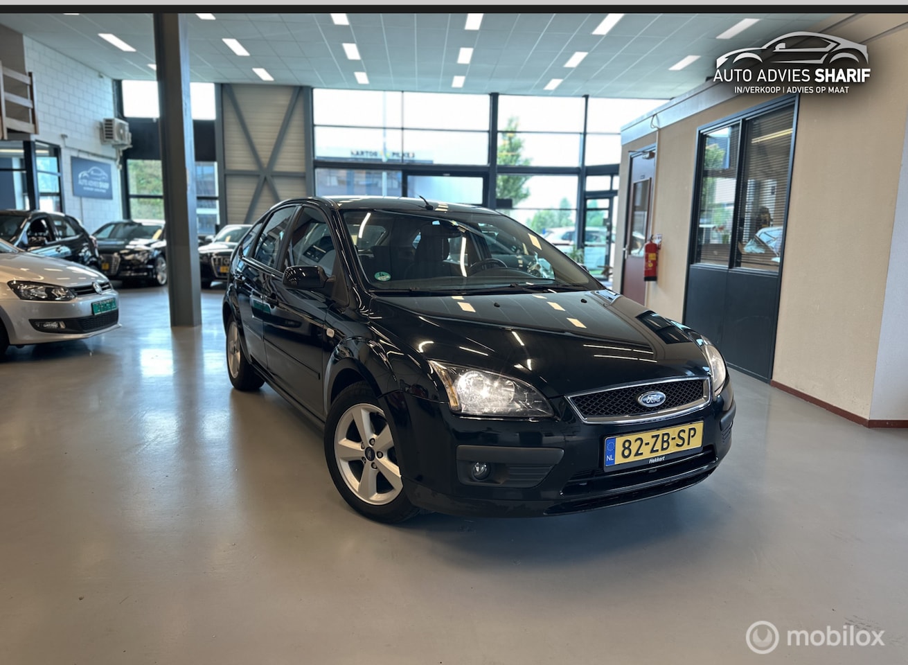Ford Focus - 1.6-16V Titanium Airco|PDC|St.verwarming|Trekhaak - AutoWereld.nl