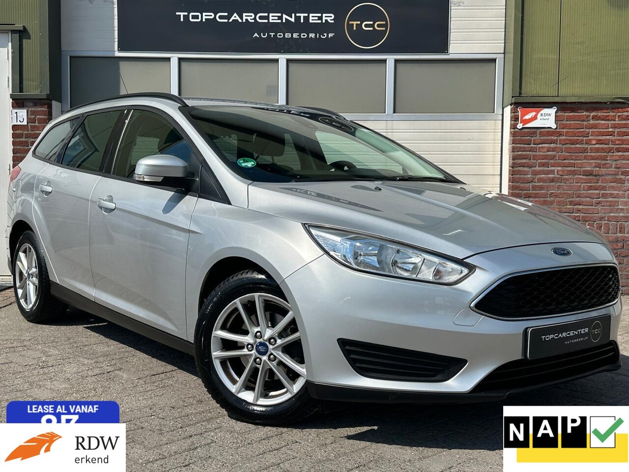 Ford Focus Wagon - 1.0 Edition/TREKH/NAVI/PARKS/CRUISE/APK/NAP - AutoWereld.nl
