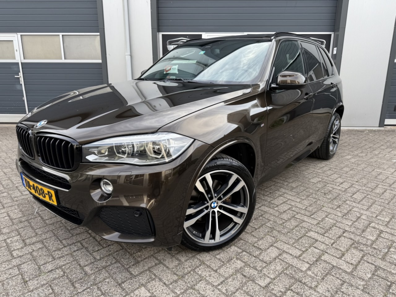 BMW X5 - xDrive30d High Exec. M-sport Pano HUD H&K Trekhaak Dealer OH Cam - AutoWereld.nl