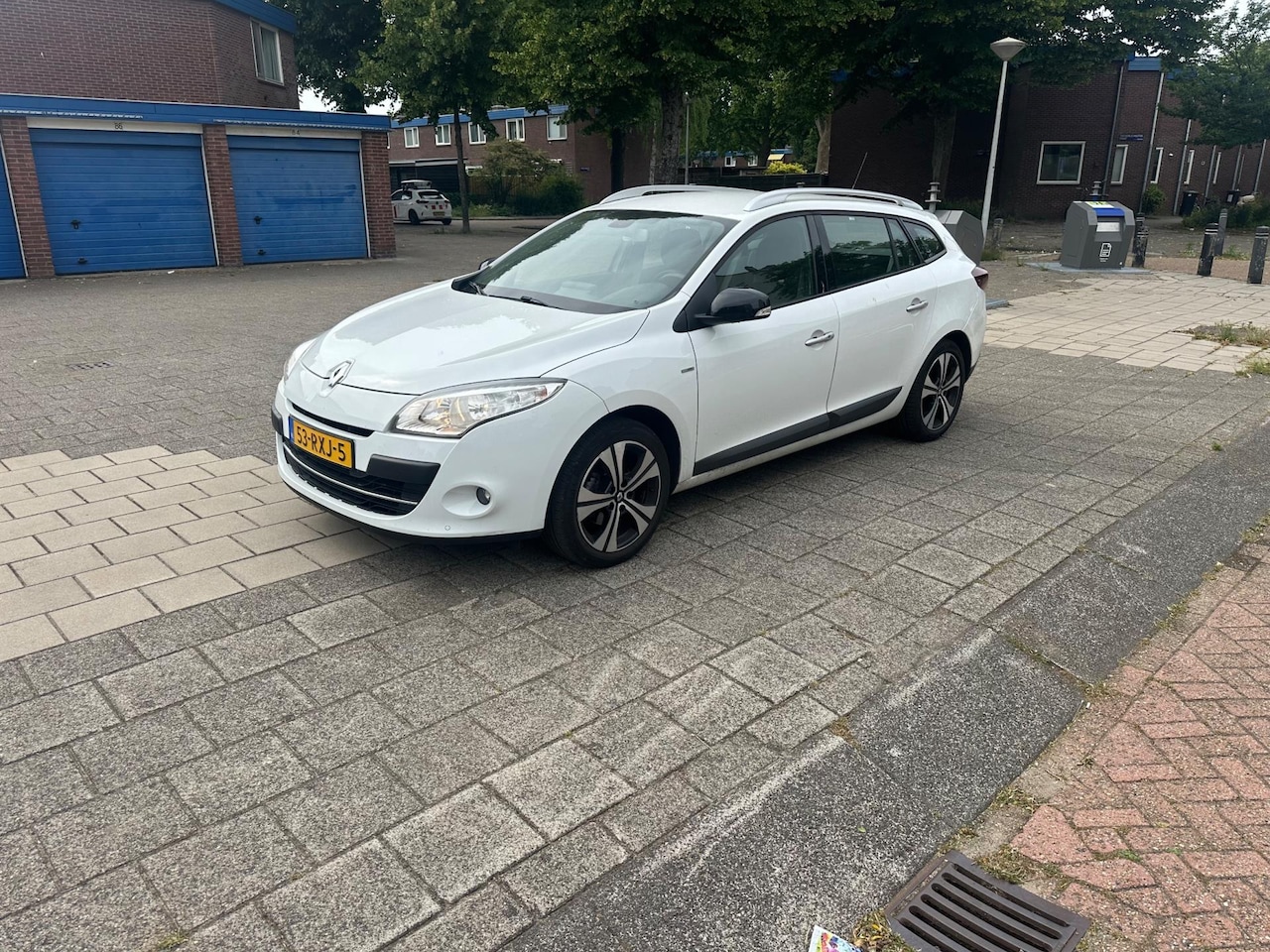 Renault Mégane Estate - 1.4 TCe Bose Snow White Climate Cruise - AutoWereld.nl