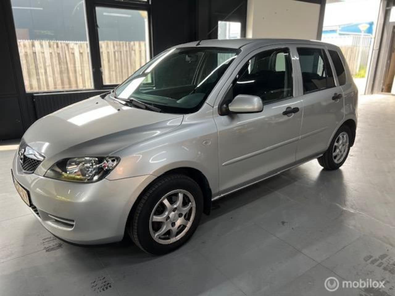 Mazda 2 - 1.4i Exclusive , 3 maanden garantie, NAP - AutoWereld.nl