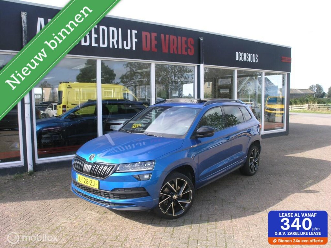 Skoda Karoq - 1.5 TSI ACT Sportline Pano/ACC/Virtual/Newmodel - AutoWereld.nl