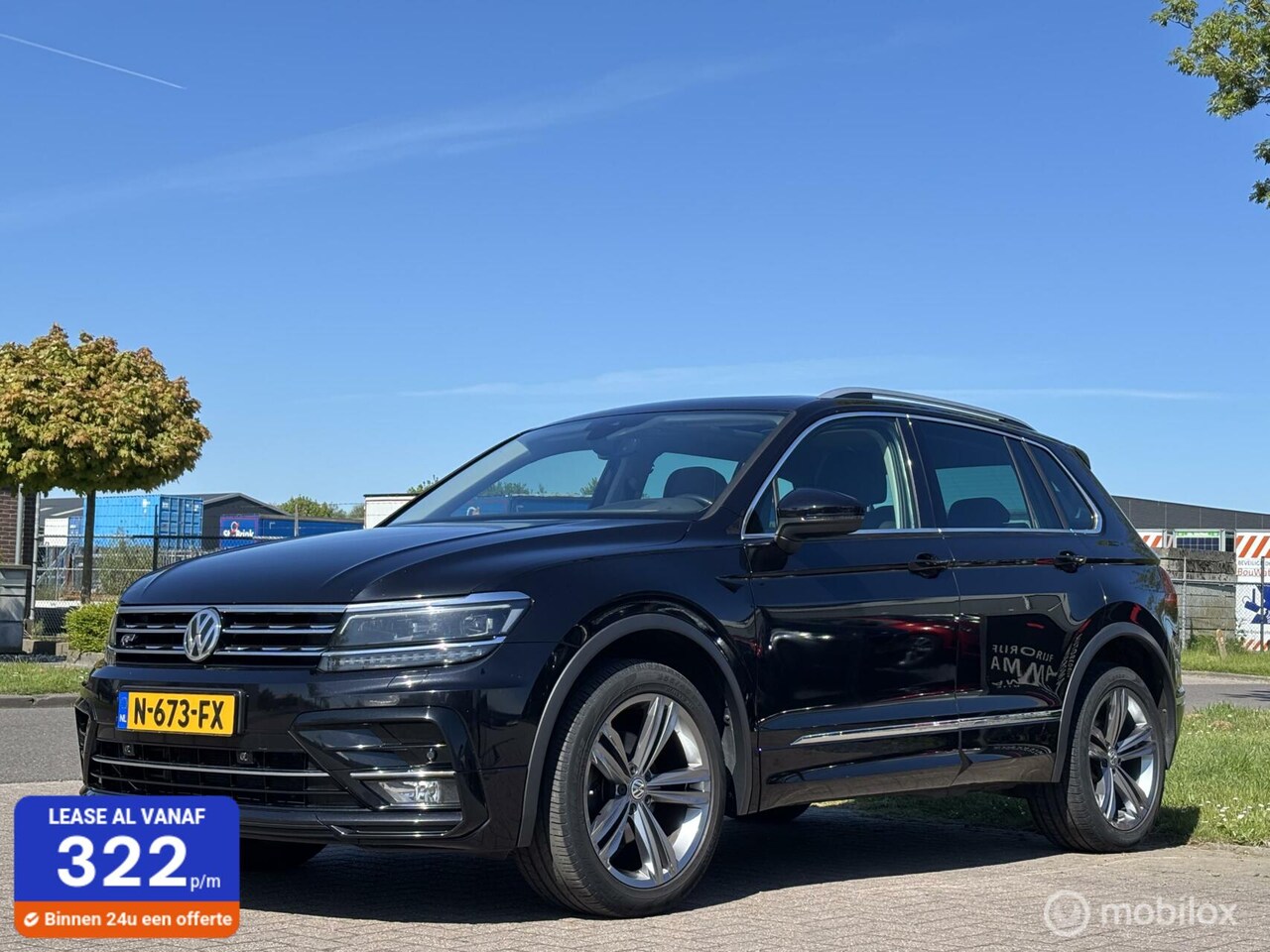 Volkswagen Tiguan - 1.4 4Motion Highline Business R trekhaak - AutoWereld.nl